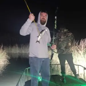 Carpe Noctum Outfitters & Lodge bowfishing photo